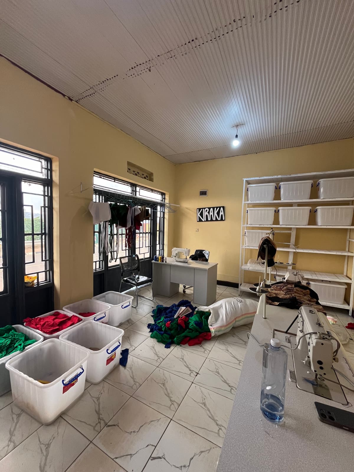 Kiraka team sorting and cleaning fabrics